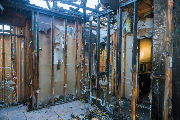 Professional Fire Damage Restoration technician working in Luxemburg, WI
